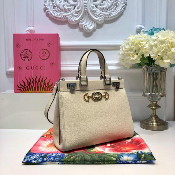 G*u*i zumi grainy leather small top handle bag