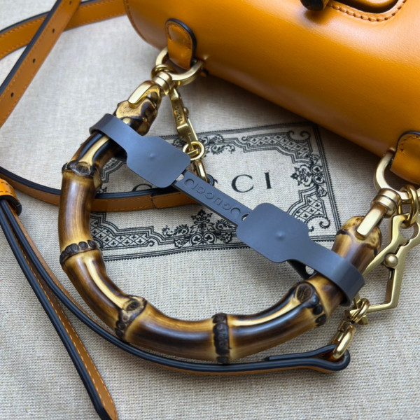 G*u*i small top handle bag with bamboo