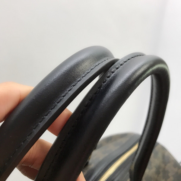 Ce**e large travel bag in triomphe canvas and calfskin