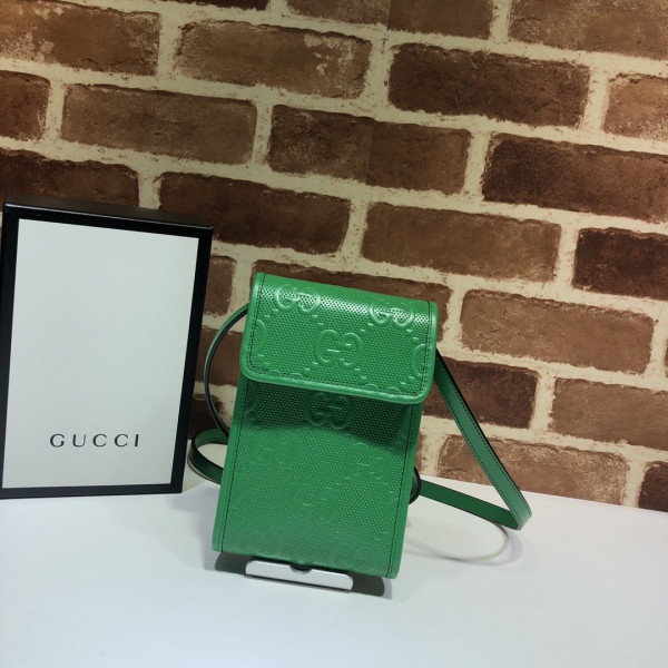 G*u*i gg embossed mini bag