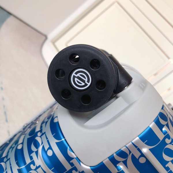 D*or x rimowa suitcase