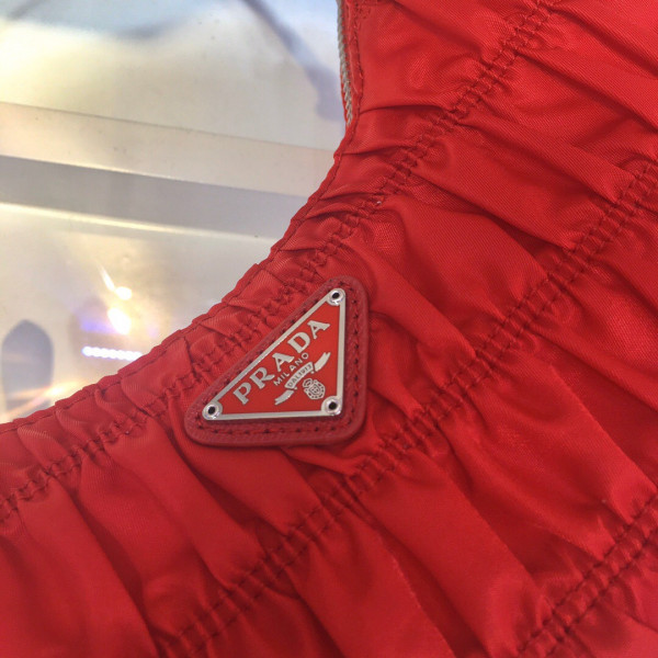 Pra*a nylon and saffiano leather mini bag