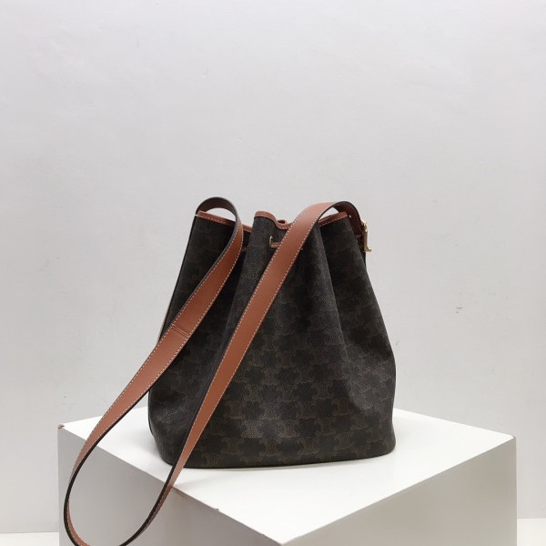 Ce**e medium drawstring bag in triomphe canvas