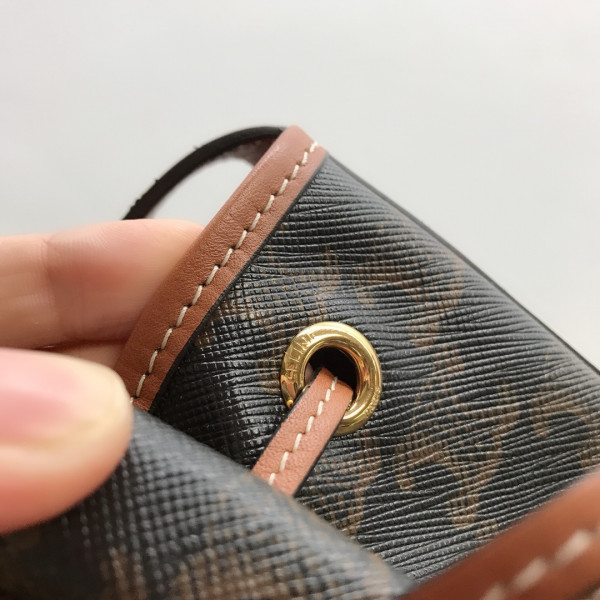 Ce**e small drawstring bag in triomphe canvas