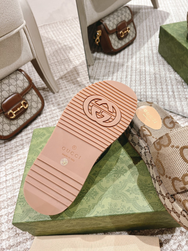 G*u*i women''s platform slide sandal