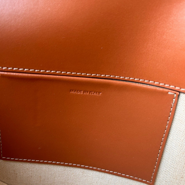 Ce**e besace cuir triomphe