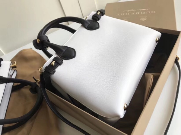 B**rry the small banner in leather and house check