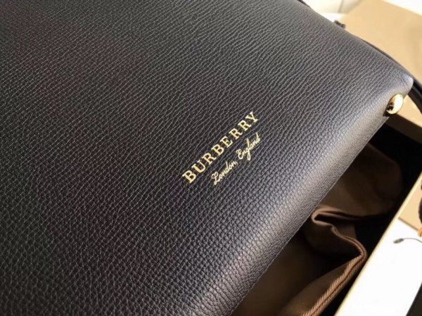 B**rry the small banner in leather and house check