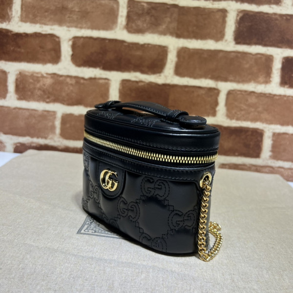 G*u*i gg matelassé top handle mini bag