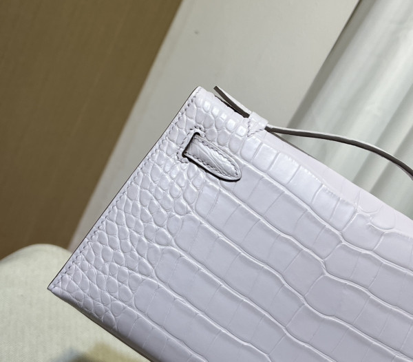 H**mes kelly pochette